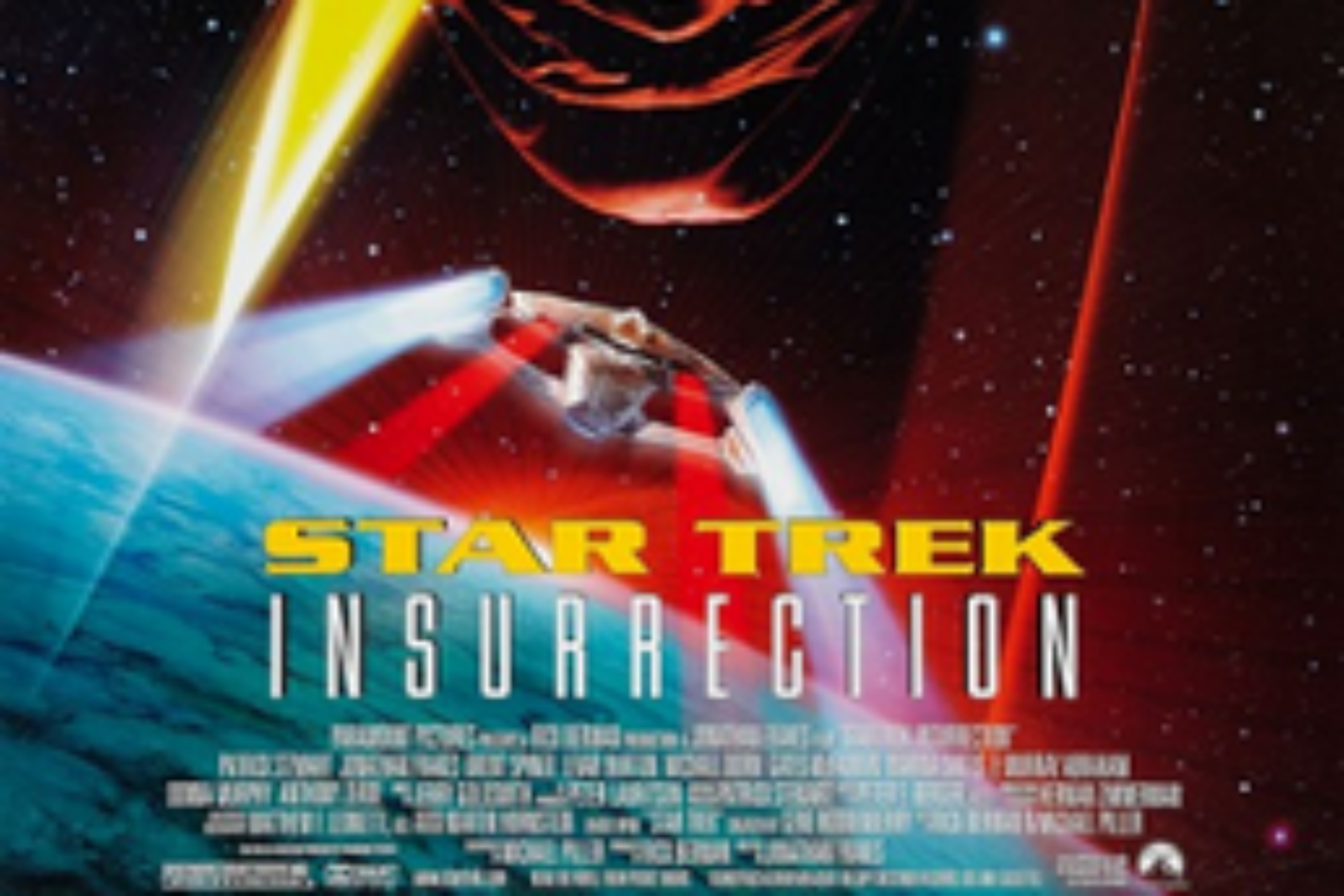 The movie poster for Star Trek: Insurrection shows a starship flying from a blue-green planet, with an orange beam above and a mysterious face in the fiery light—echoing the dramatic flair of Gilbert & Sullivan songs. Text reads: The battle for paradise has begun.