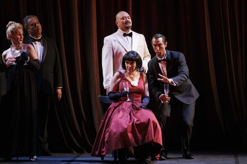 Freddie Tong, Nicole Chevalier and David Webb in ENO's La traviata (2023)