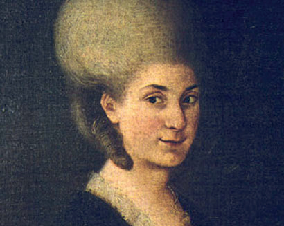 A painted portrait of a woman with pale skin, an elaborate high hairstyle, and period clothing, set against a dark background. She faces forward, slightly turned, her gentle expression evoking women from Mozart’s era on a musical journey.