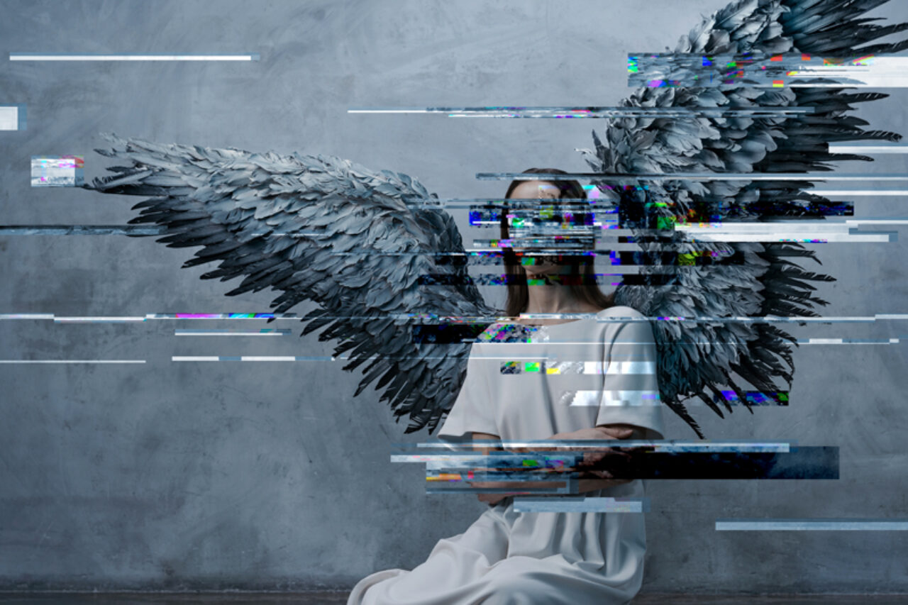 A person in a white dress with large, grey angel wings kneels on the floor against a grey wall, evoking scenes from Angel's Bone by Du Yun and Royce Vavrek. Digital glitch effects obscure parts of the figure and wings.