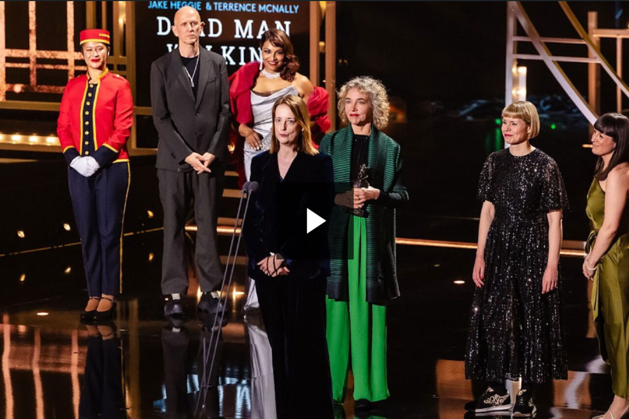Annilese Miskimmon accepts the award for Best New Opera Production for Dead Man Walking at the London Coliseum, presented by Danielle de Niese and Wayne McGregor at the Olivier Awards 2026 with Cunard at the Royal Albert Hall. 