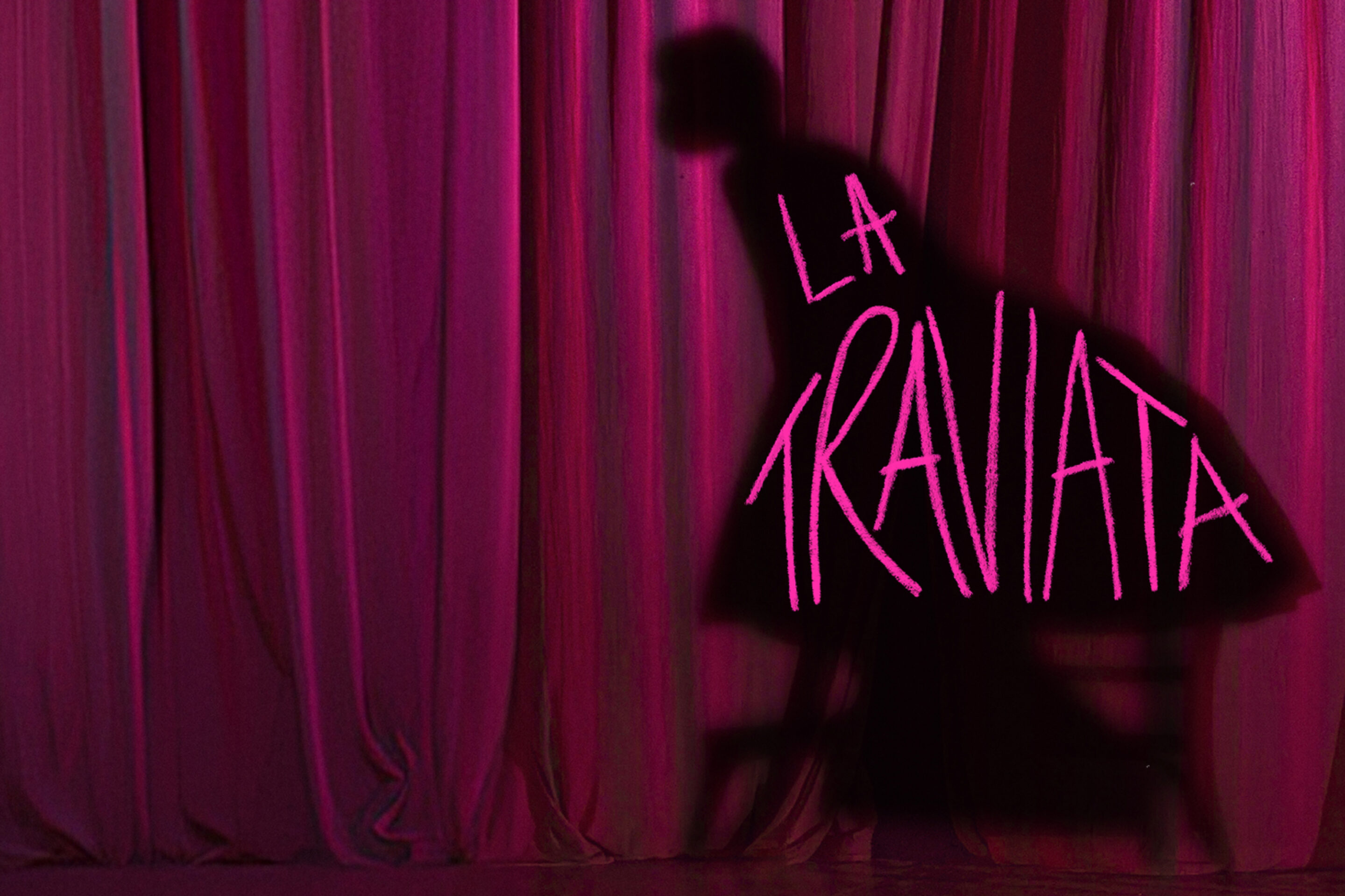 A dark silhouette of a woman in a dress stands against pink stage curtains, with the words LA TRAVIATA written in pink script across the figure.